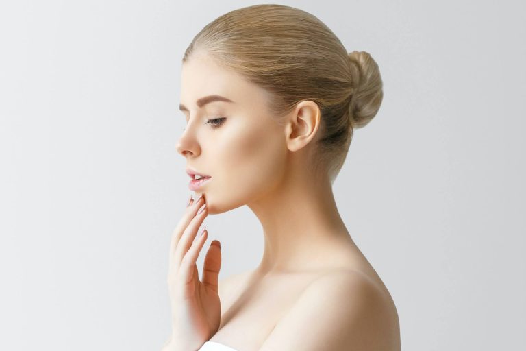 White woman with jaw contouring treatment for a more beautiful jaw line