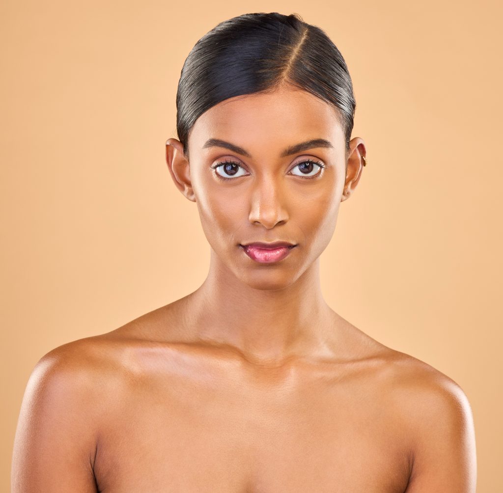A woman with beautiful skin, no wrinkles and reduced fine lines.